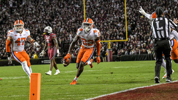 Clemson CB Andrew Booth celebrates an interception during a 2021 game